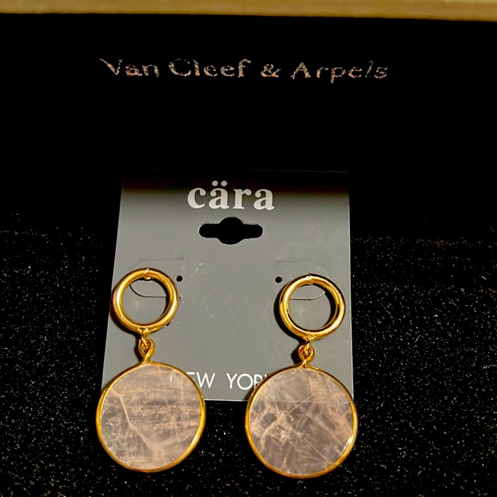 Ivory and gold earrings.